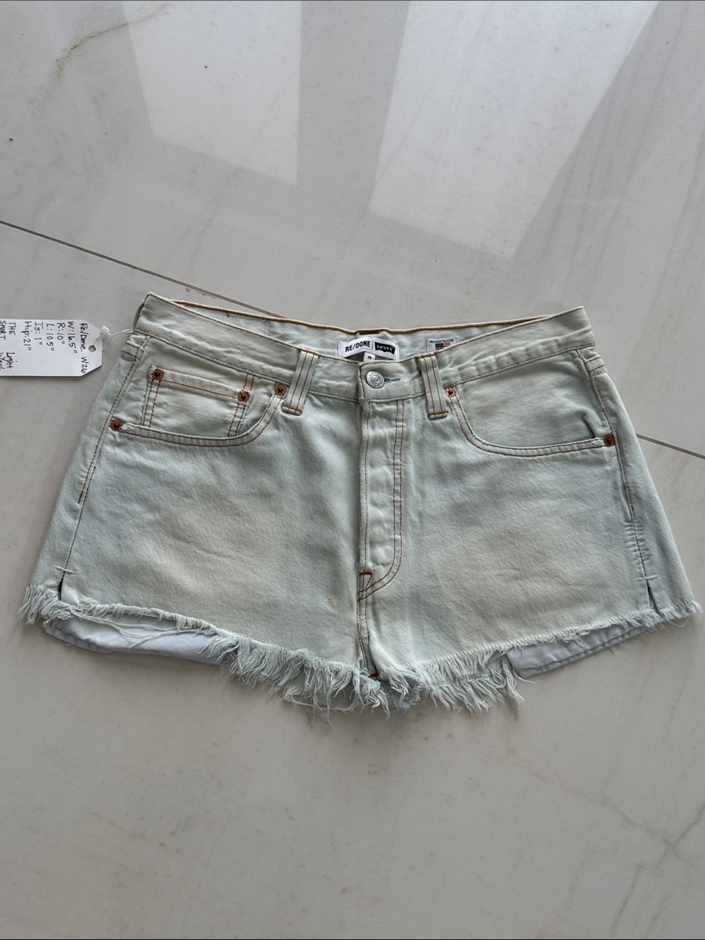 New 90s Levi’s Re/Done high rise cut off raw hem button up jean shorts size 26